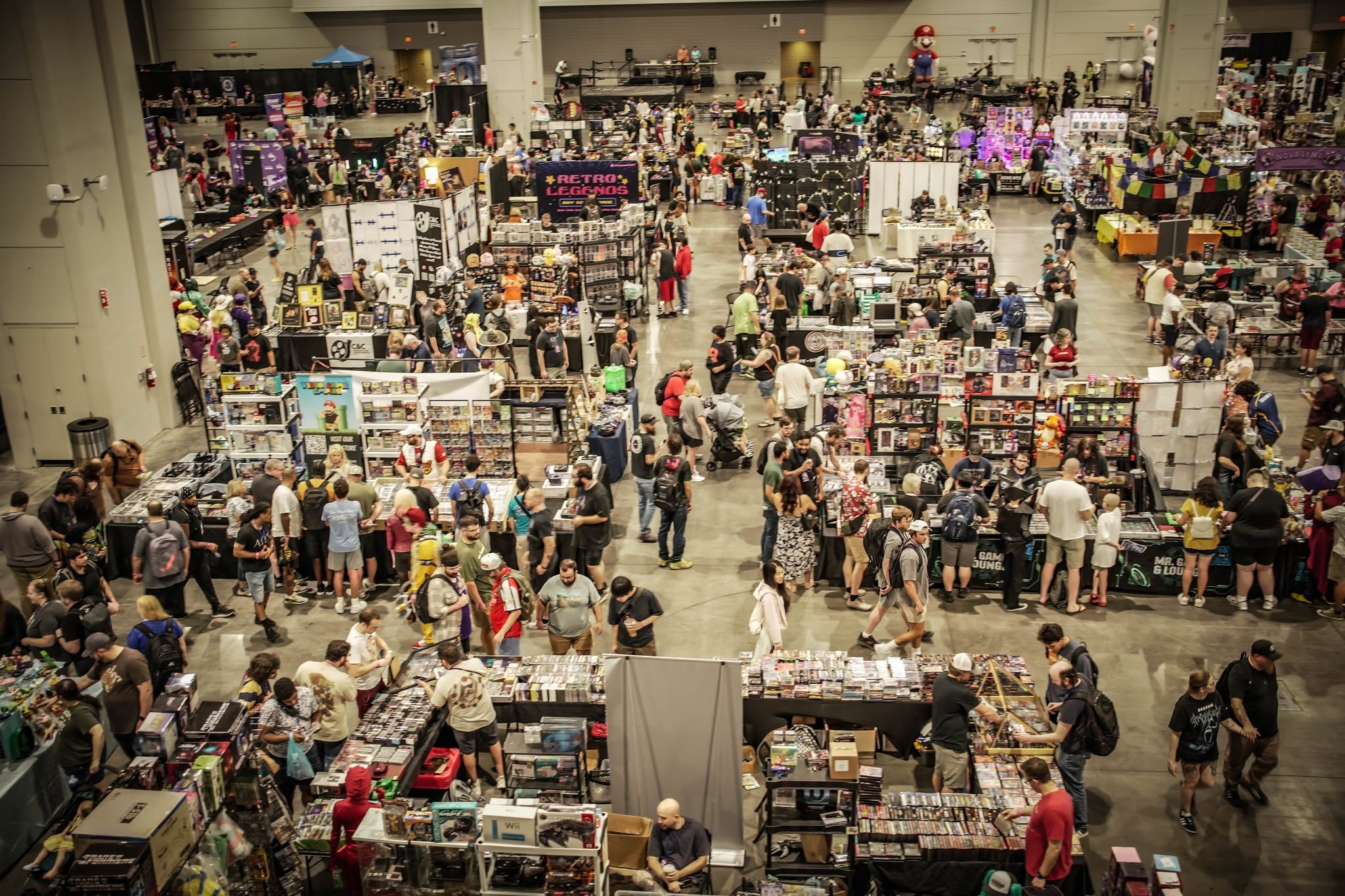 Game and Geek Expo convention floor packed with vendors and attendees